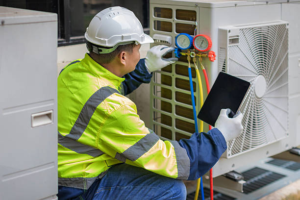 Professional Hvac Maintenance technician working in South Easton, MA